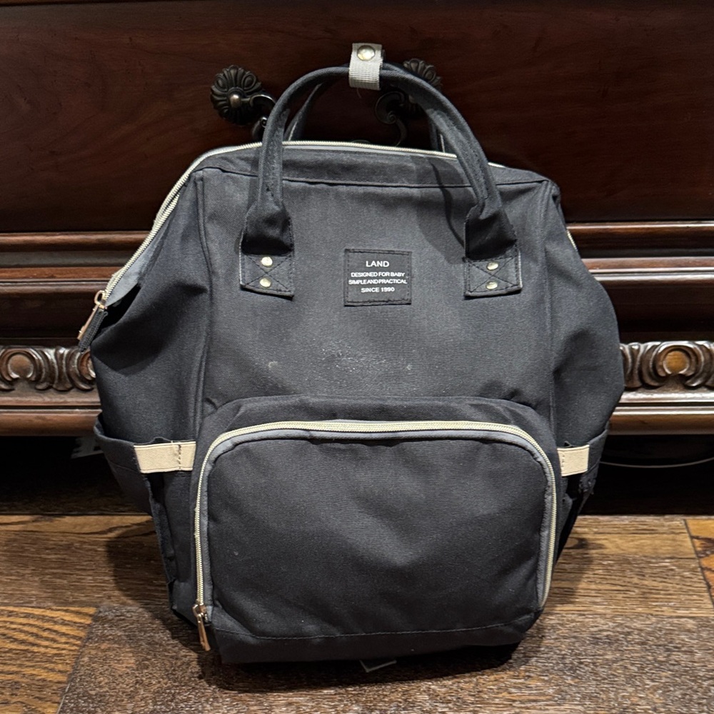 LAND Black and Tan Diaper Backpack